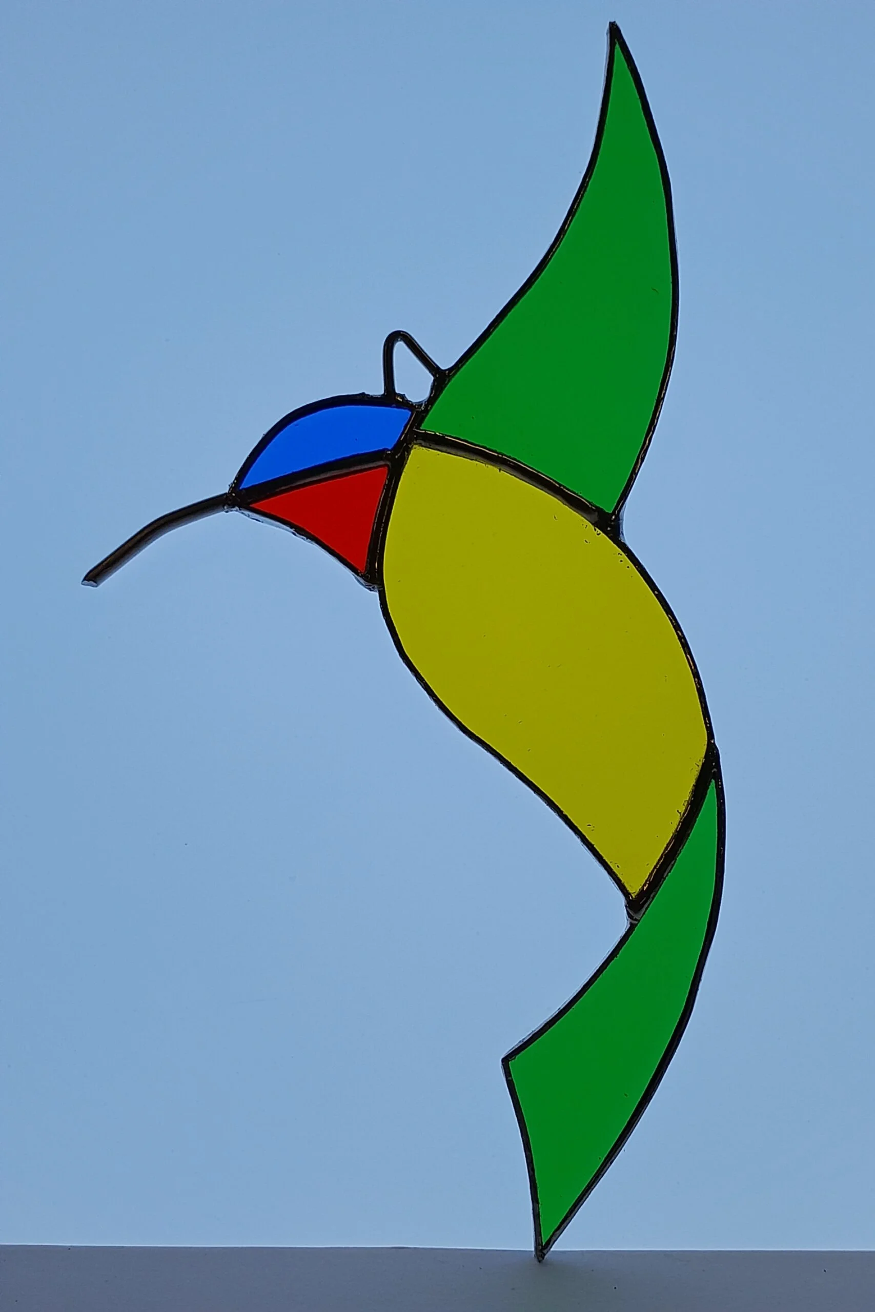 LE COLIBRI suspendu